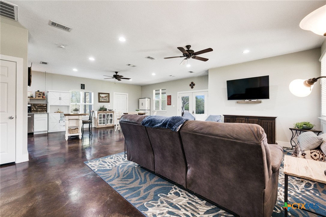469 Whispering Oaks Loop Killeen, TX 76549 - Photo 7 of 48 a living room with furniture and a flat screen tv