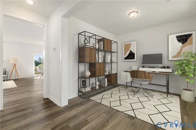 a living room with furniture and a table