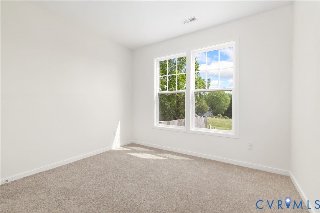 104 Pine Ridge Lane Farmville, VA 23901 - Photo 12 of 29 an empty room with a window