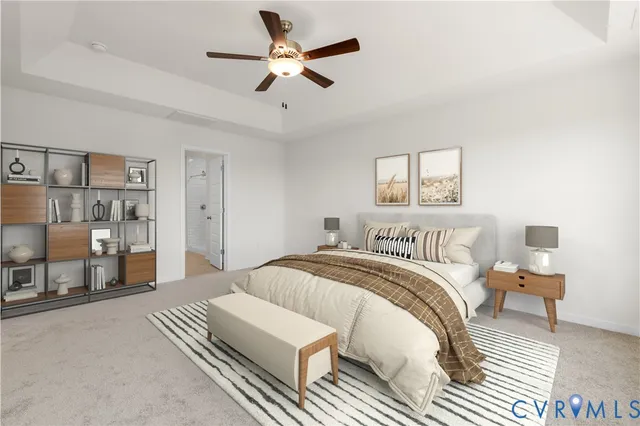 a spacious bedroom with a bed and a chandelier