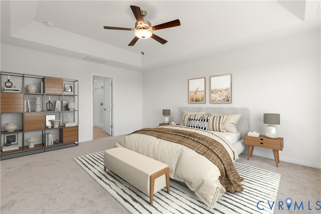 104 Pine Ridge Lane Farmville, VA 23901 - Photo 17 of 29 a spacious bedroom with a bed and a chandelier