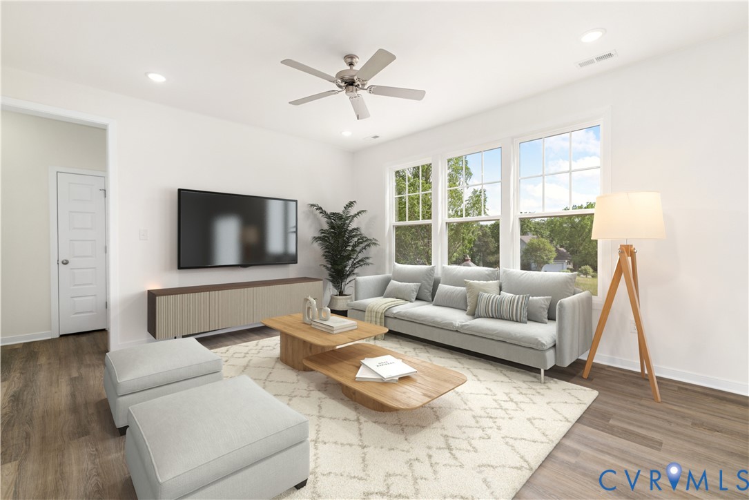 104 Pine Ridge Lane Farmville, VA 23901 - Photo 2 of 29 a living room with furniture and a flat screen tv