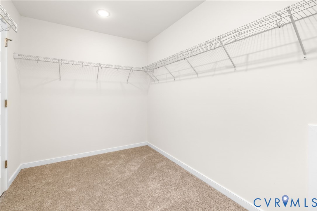 104 Pine Ridge Lane Farmville, VA 23901 - Photo 22 of 29 a view of a room with racks on the wall
