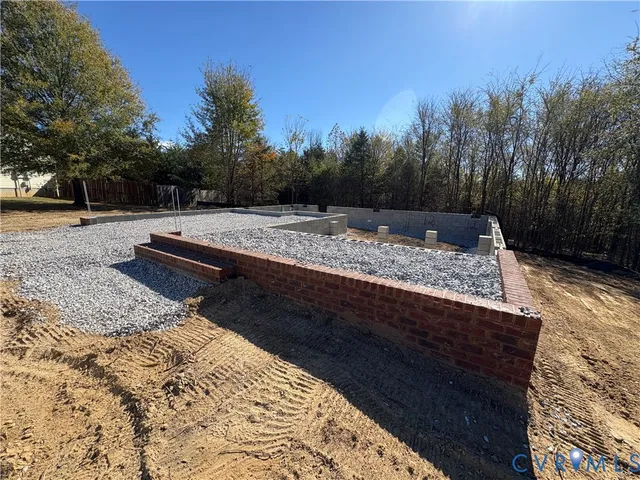 a view of a backyard of the house