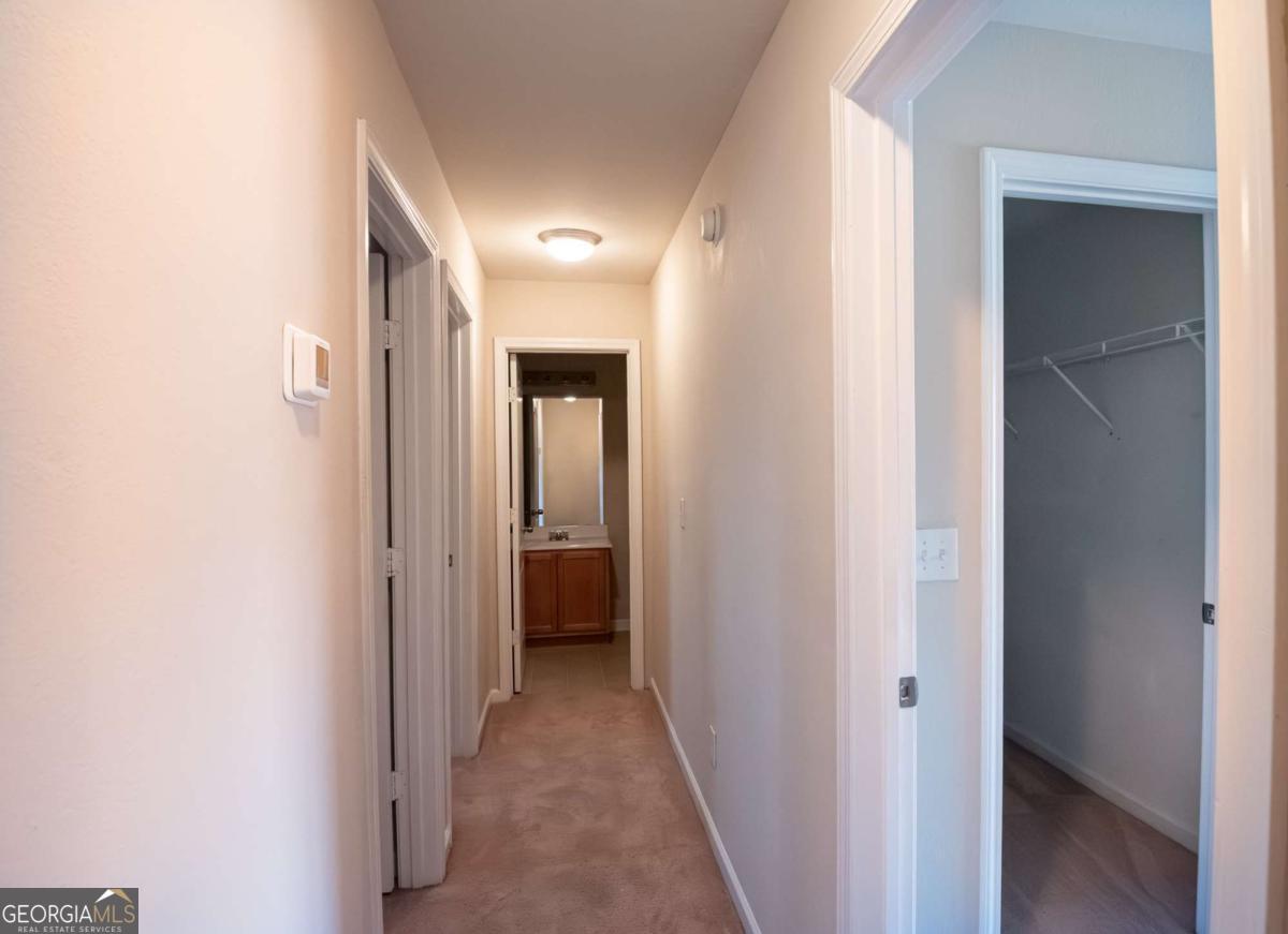 1259 Chinon Point Lithonia, GA 30058 - Photo 16 of 27 a view of a hallway with a small space