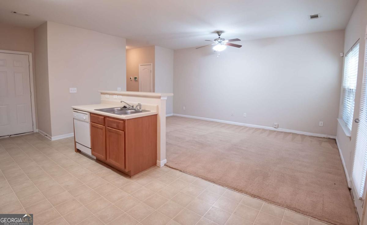 1259 Chinon Point Lithonia, GA 30058 - Photo 3 of 27 a view of a kitchen with a stove
