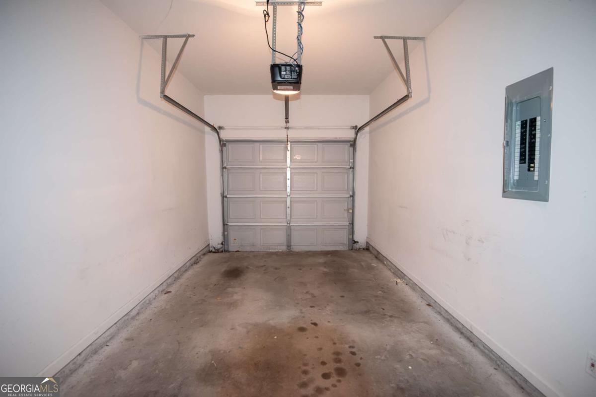 1259 Chinon Point Lithonia, GA 30058 - Photo 8 of 27 a view of a room with rack on the wall