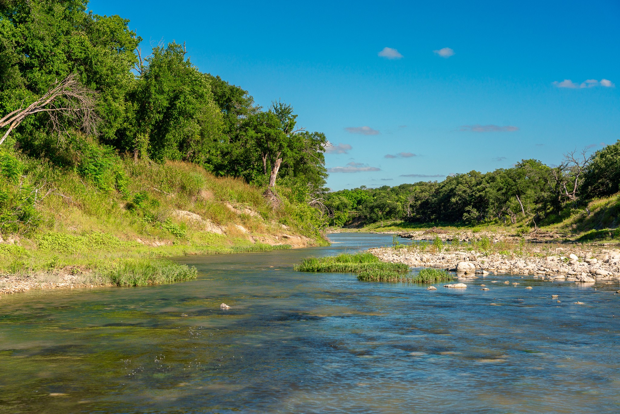 8044 580th Street East Kempner, TX 76539 - Photo 32 of 40 A tranquil river winds through verdant banks under a vast blue sky.
