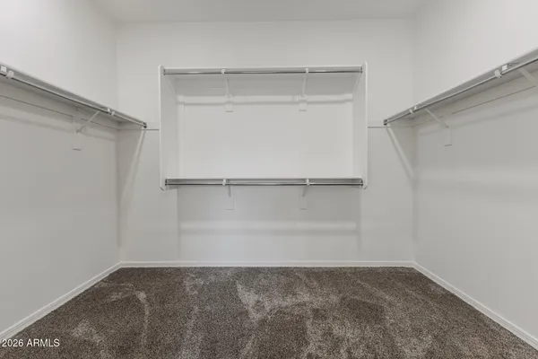 a view of an empty walk in closet