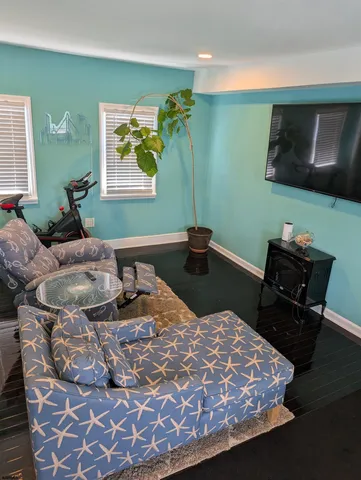 a bedroom with a bed and dresser