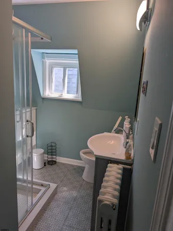 a bathroom with a sink and a toilet