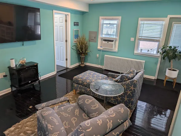 a bedroom with a bed and a chair