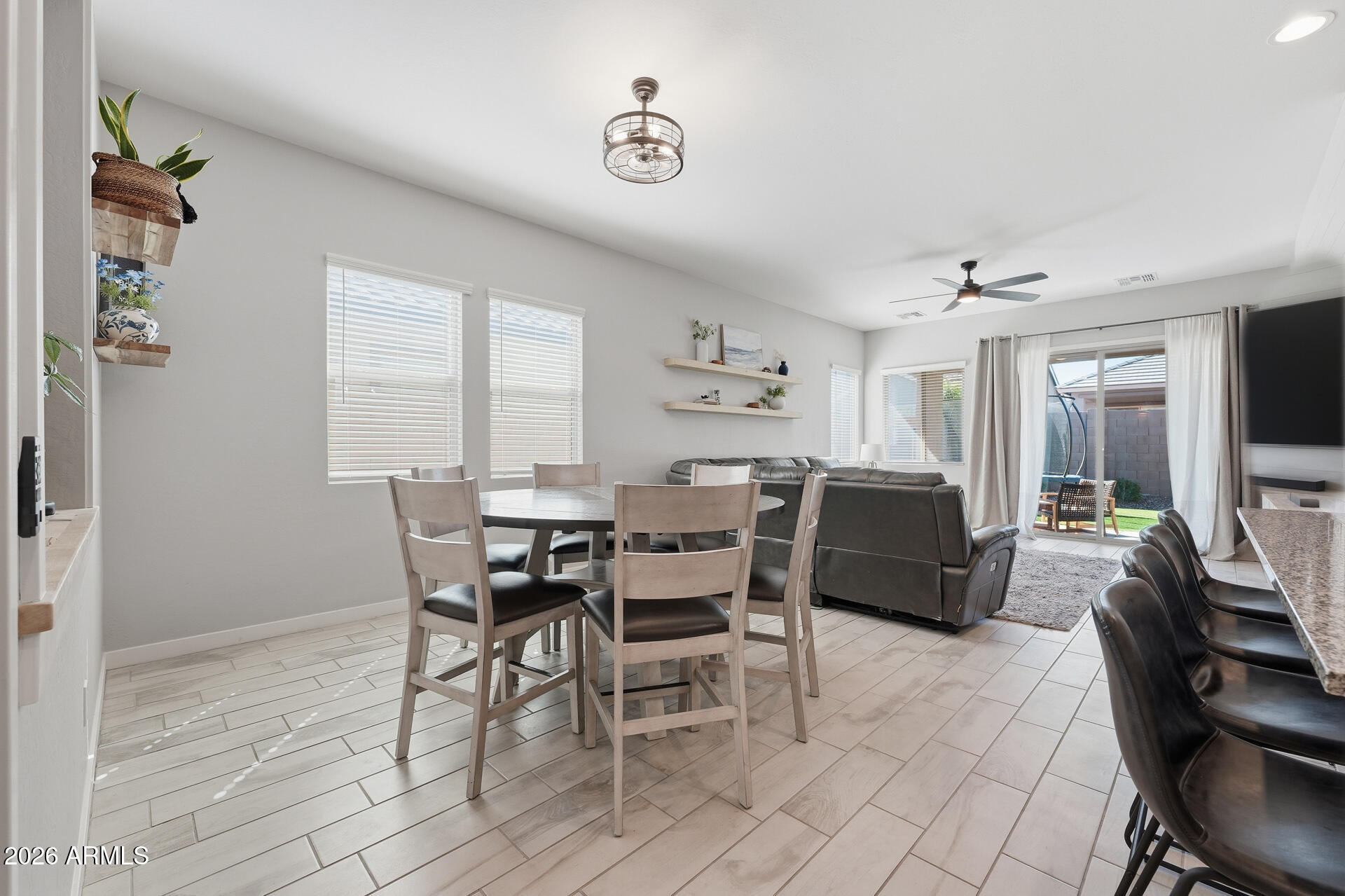23069 East Mayberry Road Queen Creek, AZ 85142 - Photo 12 of 48 a dining room with furniture and window