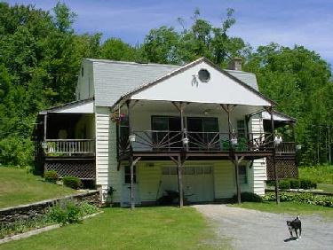 23 Savoy Road Florida, MA 01247 - Photo 1 of 2 a front view of a house with a yard