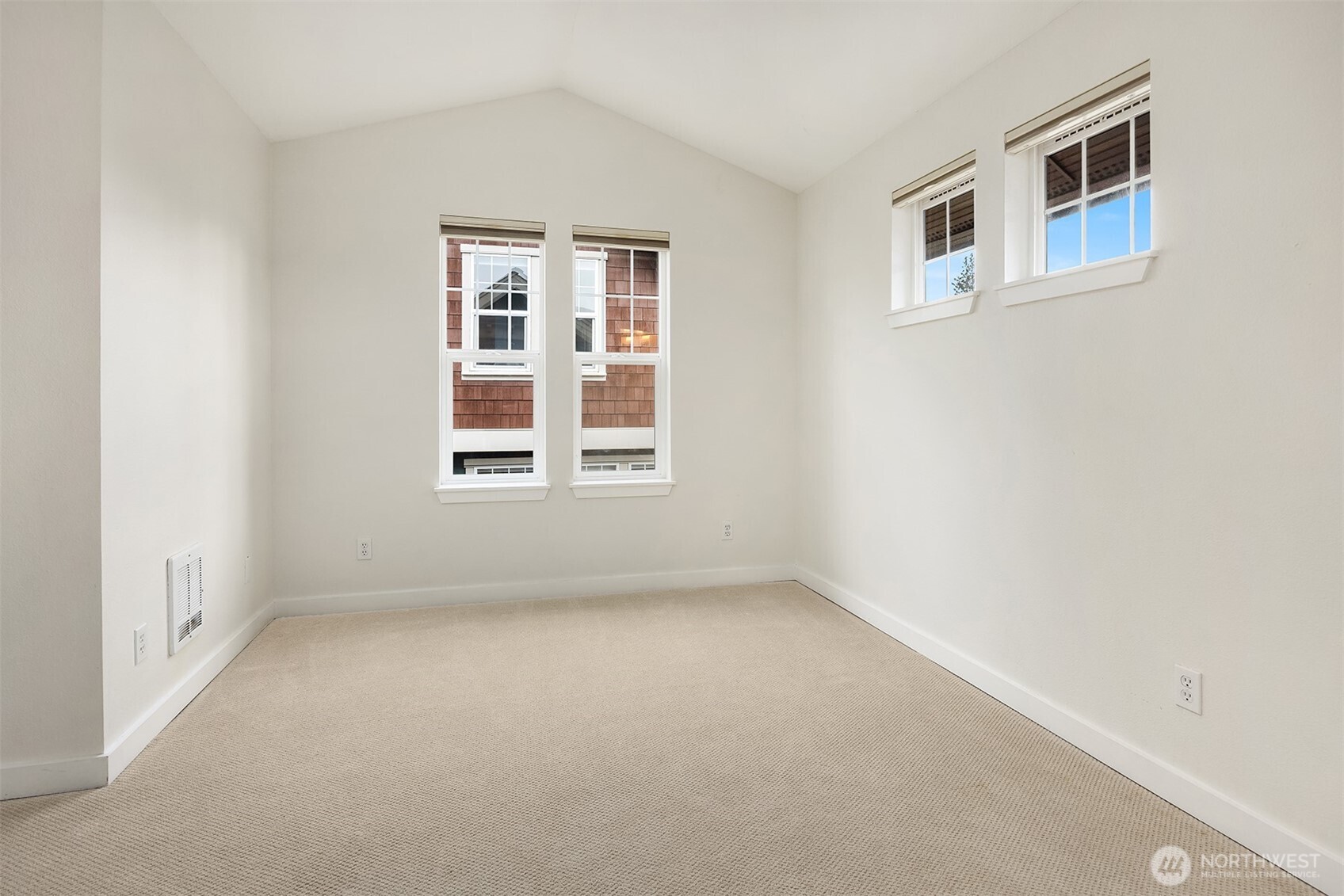 5430 California Avenue Southwest, Unit 2D Seattle, WA 98136 - Photo 15 of 26 a view of an empty room with a window