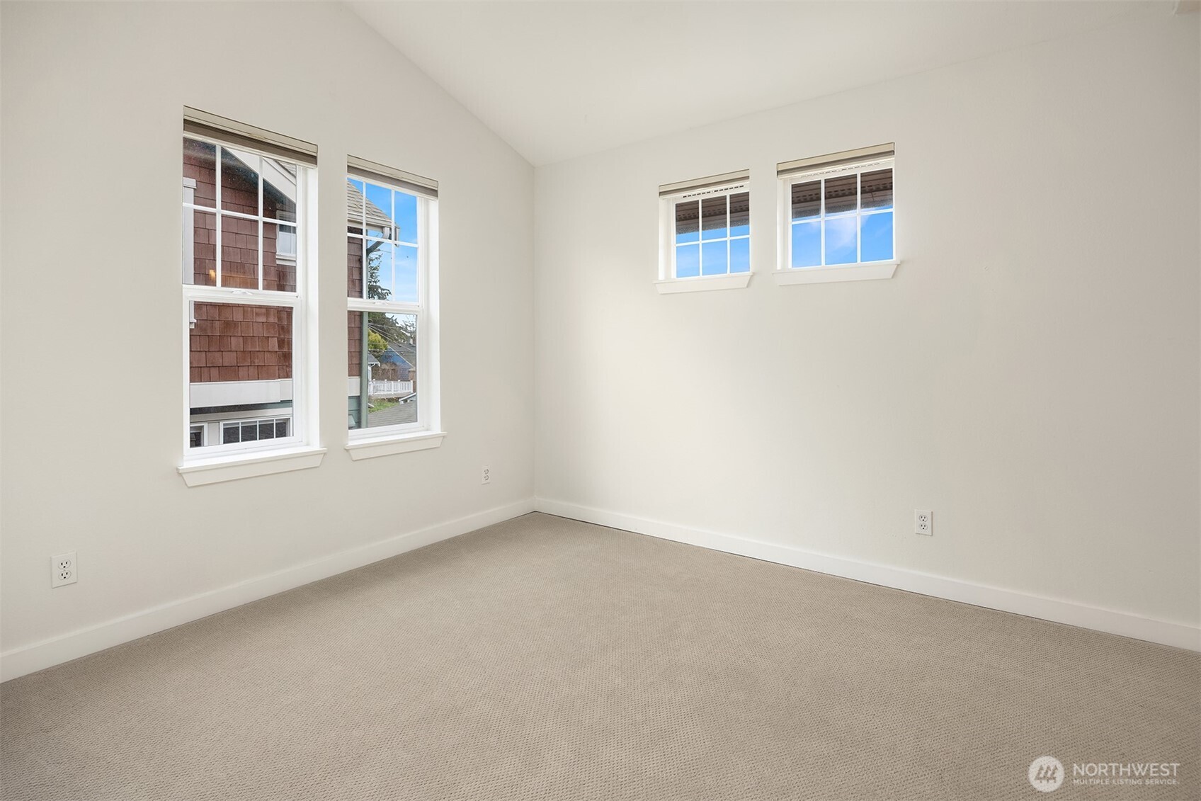 5430 California Avenue Southwest, Unit 2D Seattle, WA 98136 - Photo 16 of 26 an empty room with a window