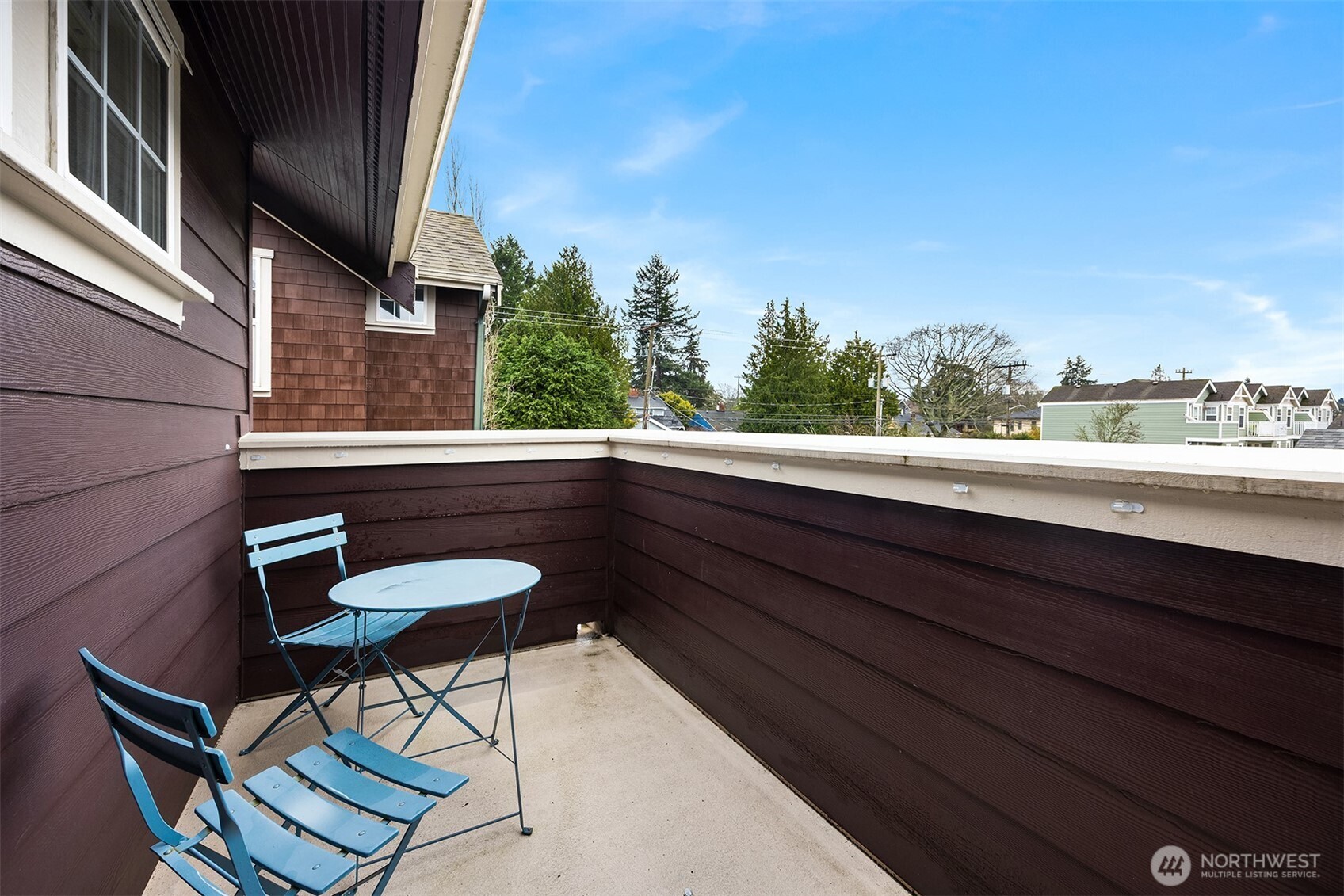 5430 California Avenue Southwest, Unit 2D Seattle, WA 98136 - Photo 20 of 26 a view of a balcony with chairs