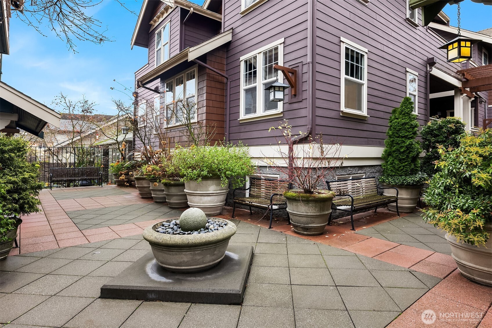 5430 California Avenue Southwest, Unit 2D Seattle, WA 98136 - Photo 24 of 26 a front view of a house with sitting area