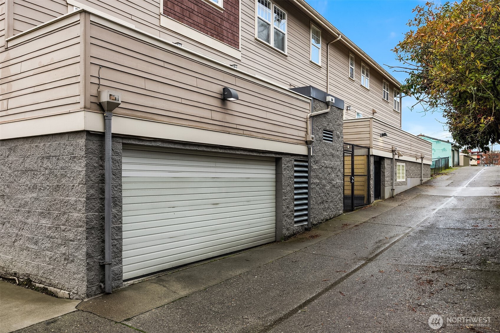 5430 California Avenue Southwest, Unit 2D Seattle, WA 98136 - Photo 25 of 26 a view of a white house with a large windows