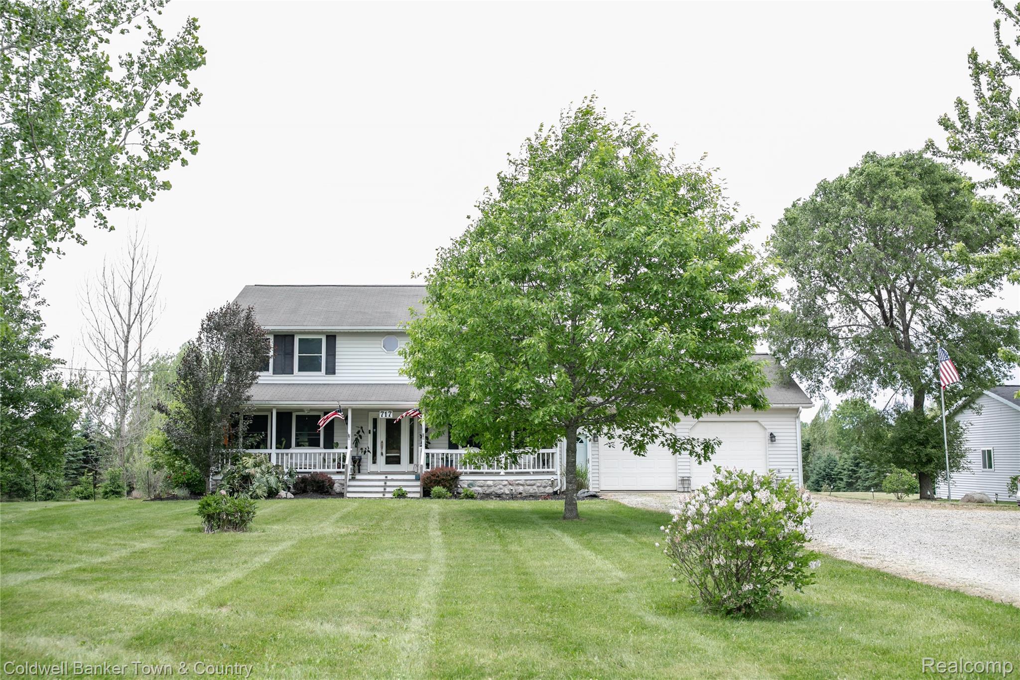 717 North Youngs Road Attica, MI 48412 - Photo 5 of 87 Two-story residence featuring white siding and dark shutters