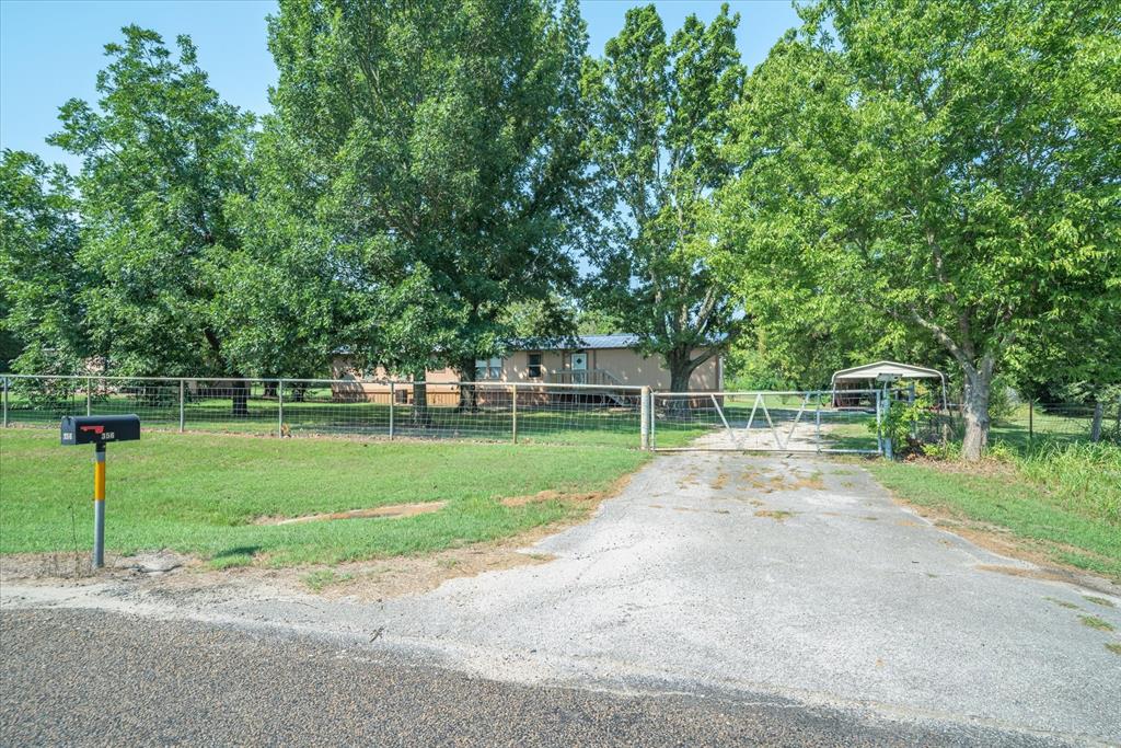 356 Farm To Market Road 751 Wills Point, TX 75169 - Photo 7 of 31 a view of a park with large trees