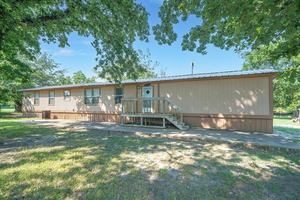 356 Farm To Market Road 751 Wills Point, TX 75169 - Photo 10 of 31 a view of a house with backyard and sitting area