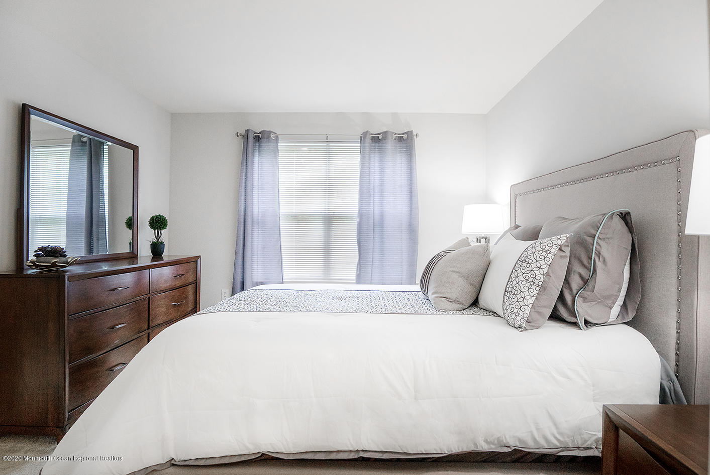 912 Timber Ridge Court Neptune Township, NJ 07753 - Photo 13 of 21 a bedroom with a large bed and a dresser
