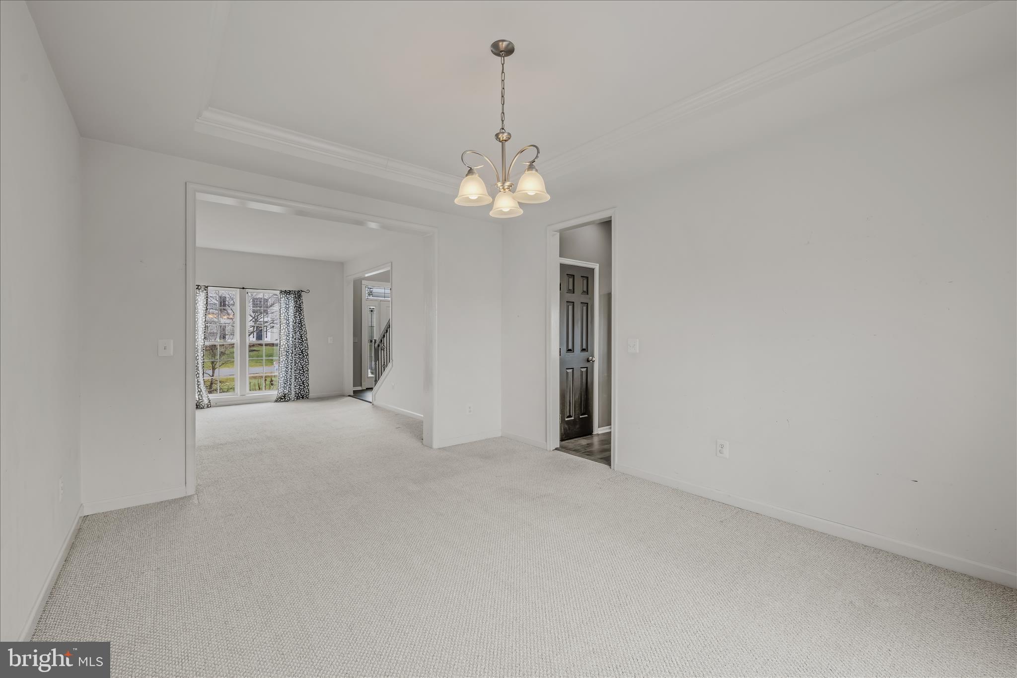 109 Turnberry Drive Charles Town, WV 25414 - Photo 11 of 77 a view of a chandelier in big room and chandelier