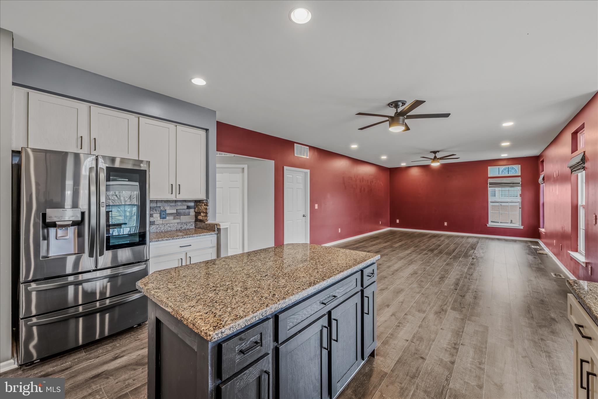 109 Turnberry Drive Charles Town, WV 25414 - Photo 14 of 77 a kitchen with kitchen island a sink appliances and a counter space