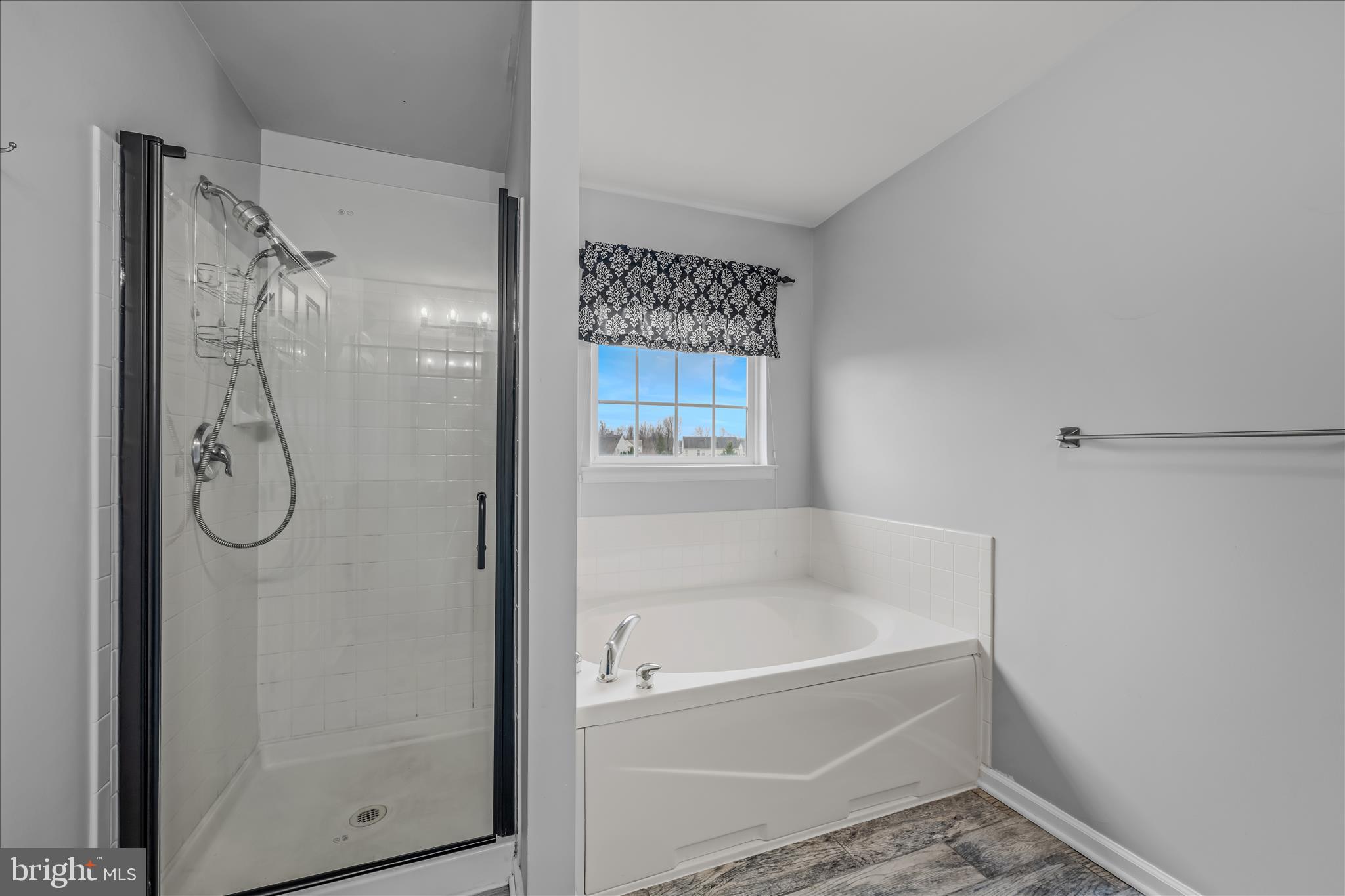 109 Turnberry Drive Charles Town, WV 25414 - Photo 27 of 77 a bathroom with a bath tub and a shower