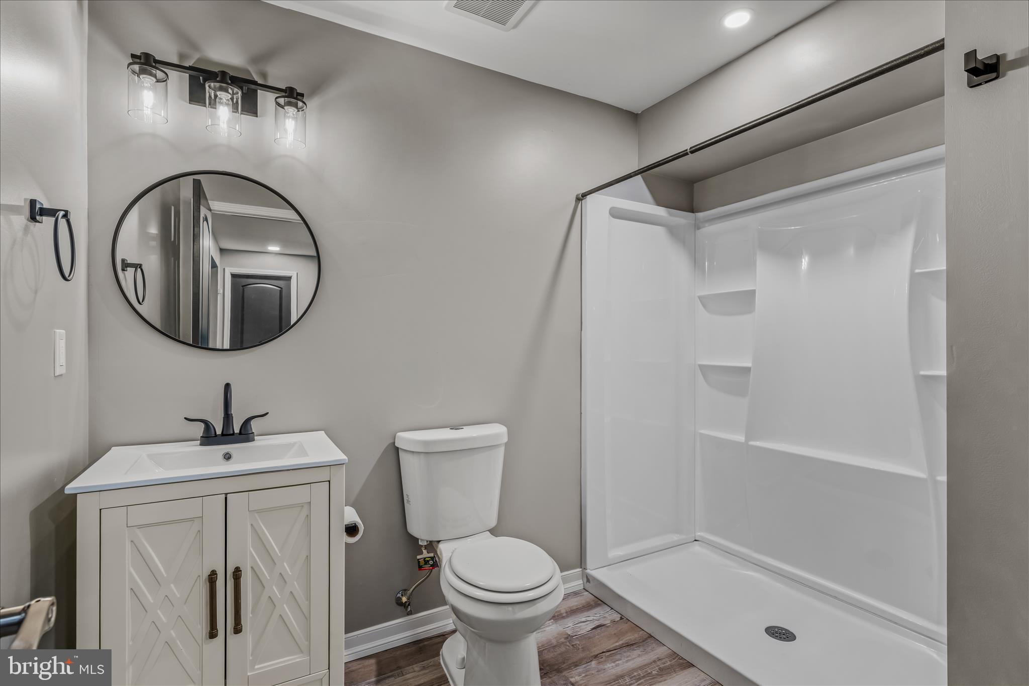 109 Turnberry Drive Charles Town, WV 25414 - Photo 45 of 77 a bathroom with a toilet sink and shower