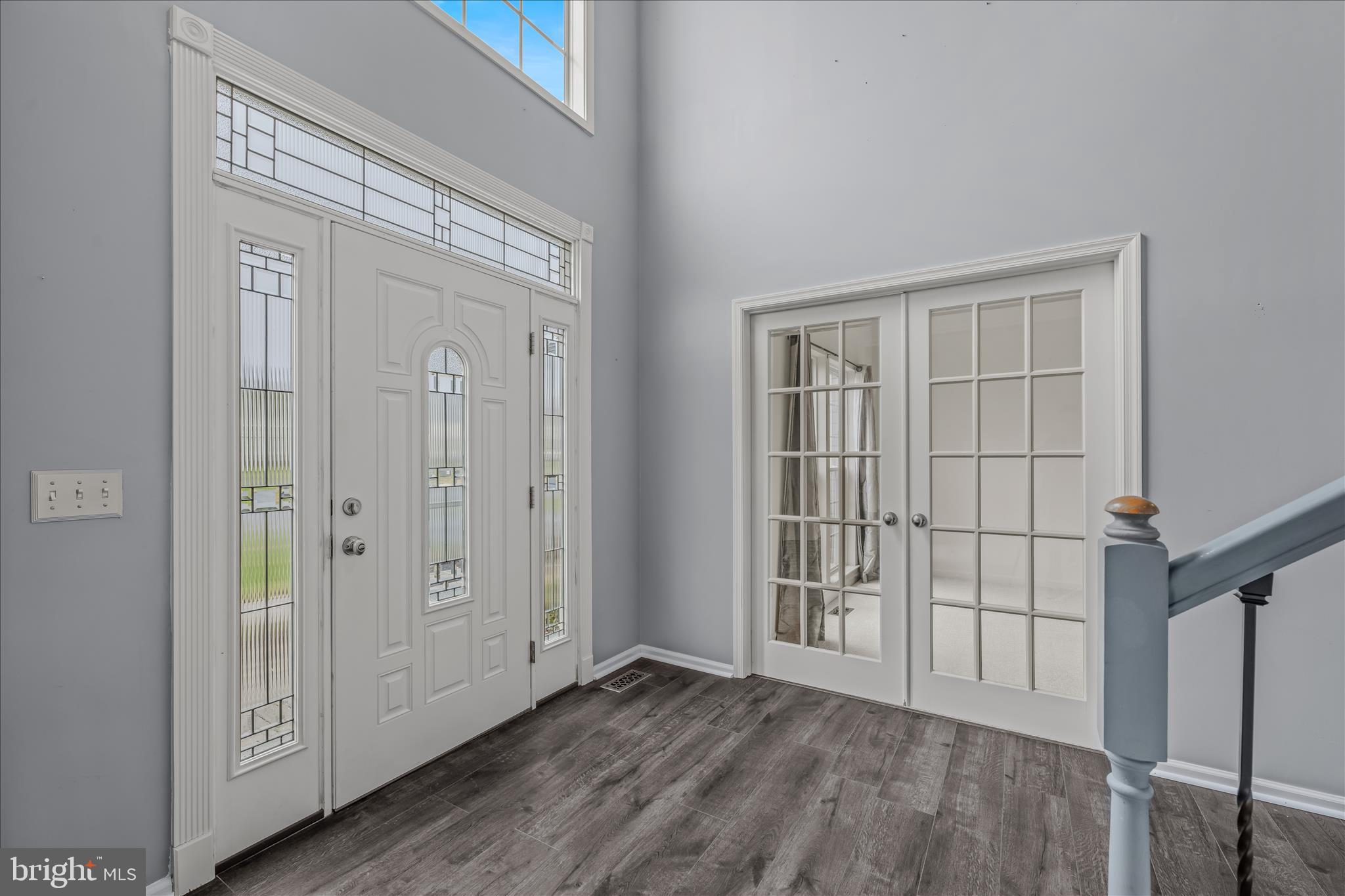 109 Turnberry Drive Charles Town, WV 25414 - Photo 5 of 77 an empty room with wooden floor and windows