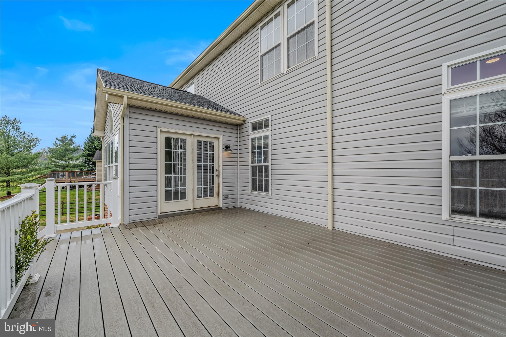 109 Turnberry Drive Charles Town, WV 25414 - Photo 51 of 77 a view of a house with deck and wooden floor