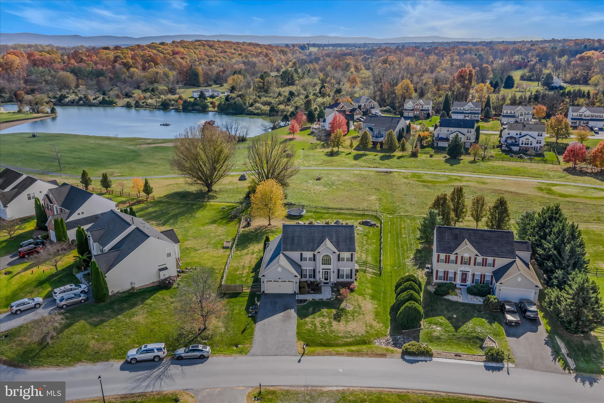 109 Turnberry Drive Charles Town, WV 25414 - Photo 73 of 77 an aerial view of a house with a garden and lake view