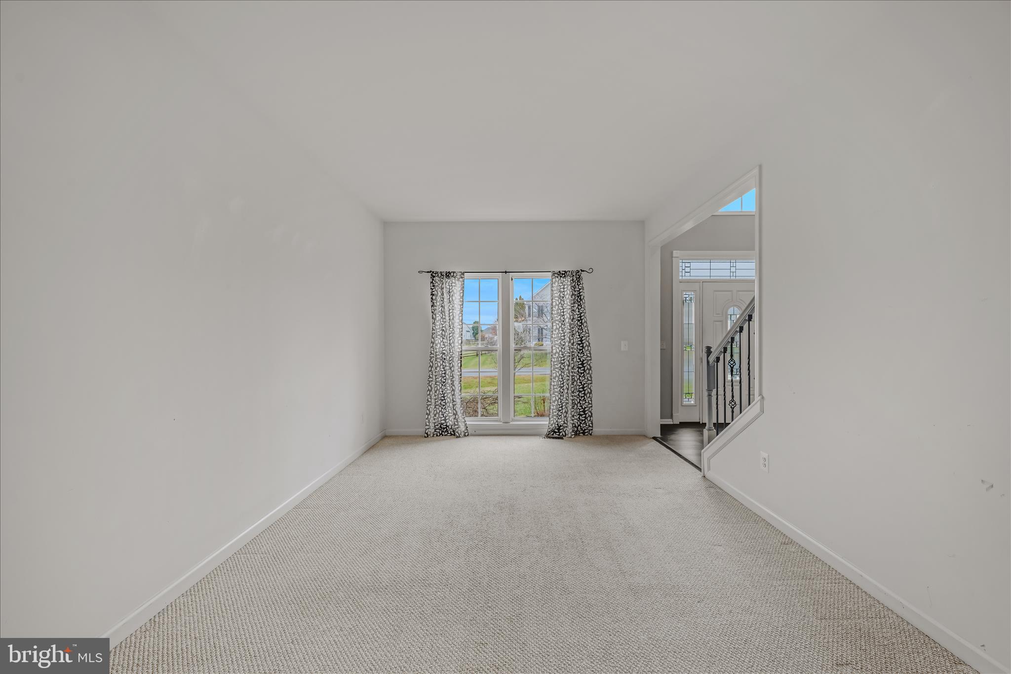 109 Turnberry Drive Charles Town, WV 25414 - Photo 9 of 77 an empty room with windows
