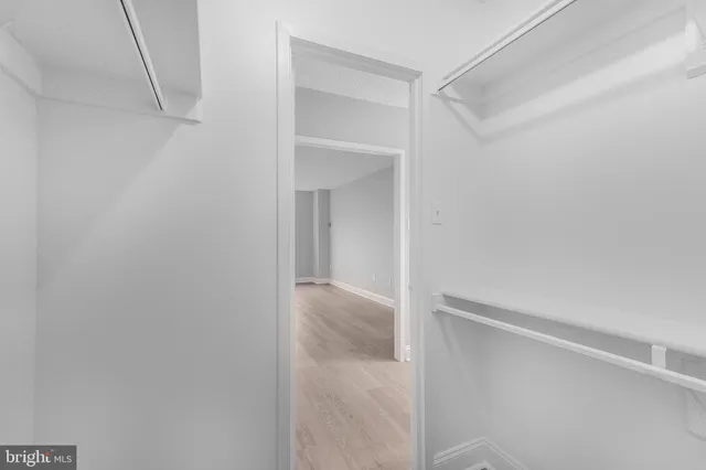 a view of an empty walk in closet