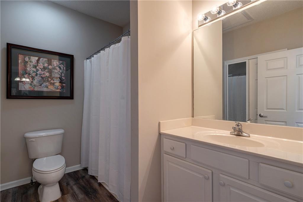 326 Camry Circle Dallas, GA 30157 - Photo 16 of 31 a bathroom with a sink and a toilet