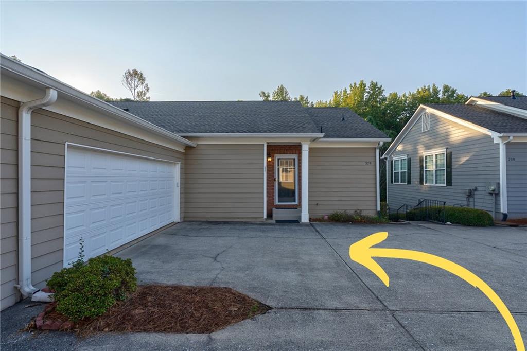 326 Camry Circle Dallas, GA 30157 - Photo 29 of 31 a view of a house with swimming pool and porch