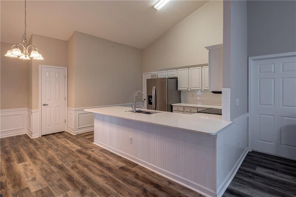 326 Camry Circle Dallas, GA 30157 - Photo 8 of 31 a spacious bathroom with a sink double vanity and a mirror