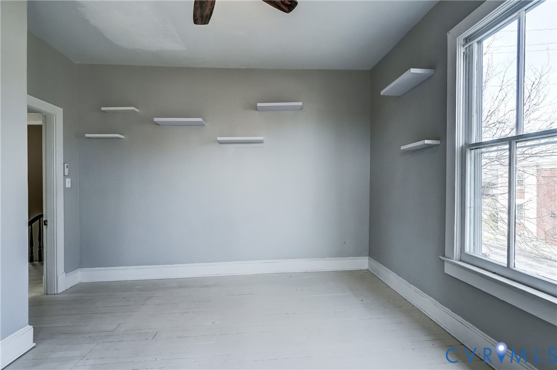 418 4th Street West Point, VA 23181 - Photo 21 of 36 a view of an empty room with a window