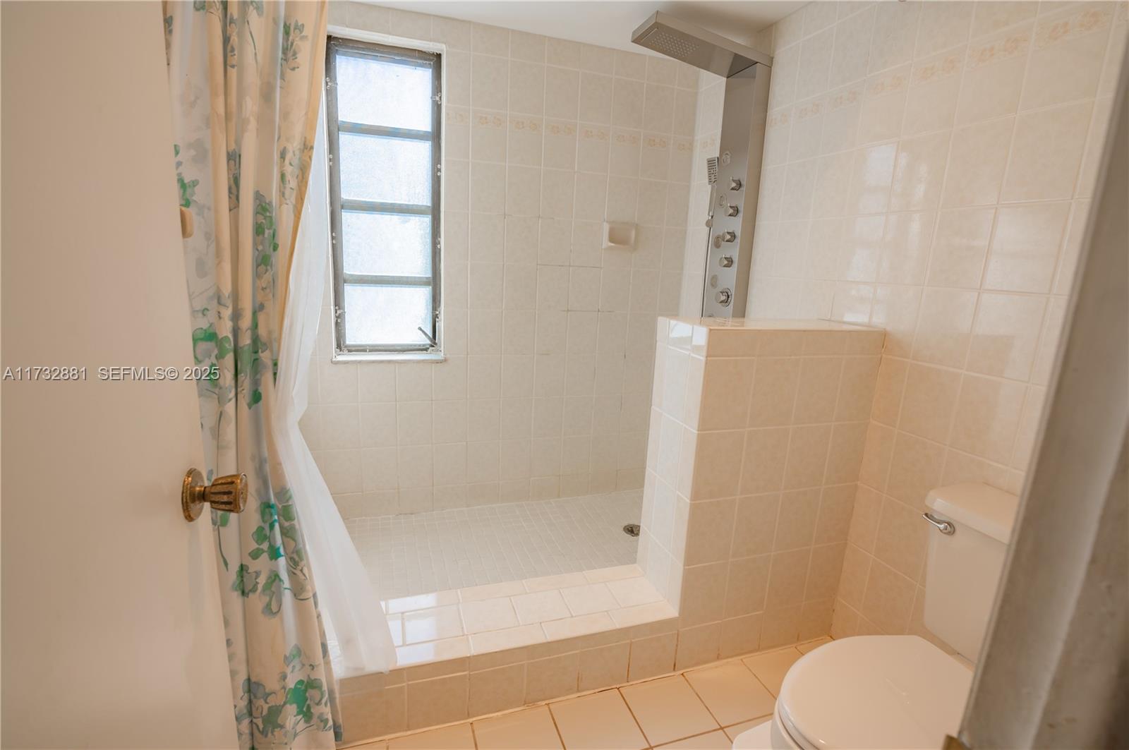 36 Eastmont Road Hollywood, FL 33021 - Photo 22 of 30 a bathroom with a shower and toilet