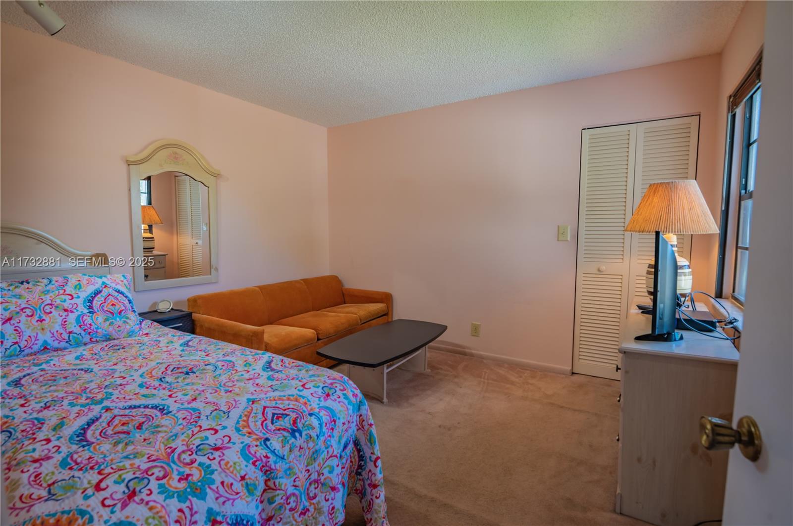 36 Eastmont Road Hollywood, FL 33021 - Photo 23 of 30 a bedroom with two beds and a lamp
