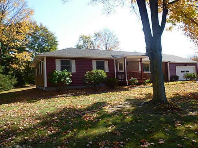 1364 Mapleton Avenue Suffield, CT 06078 - Photo 1 of 1 front view of a house with a yard