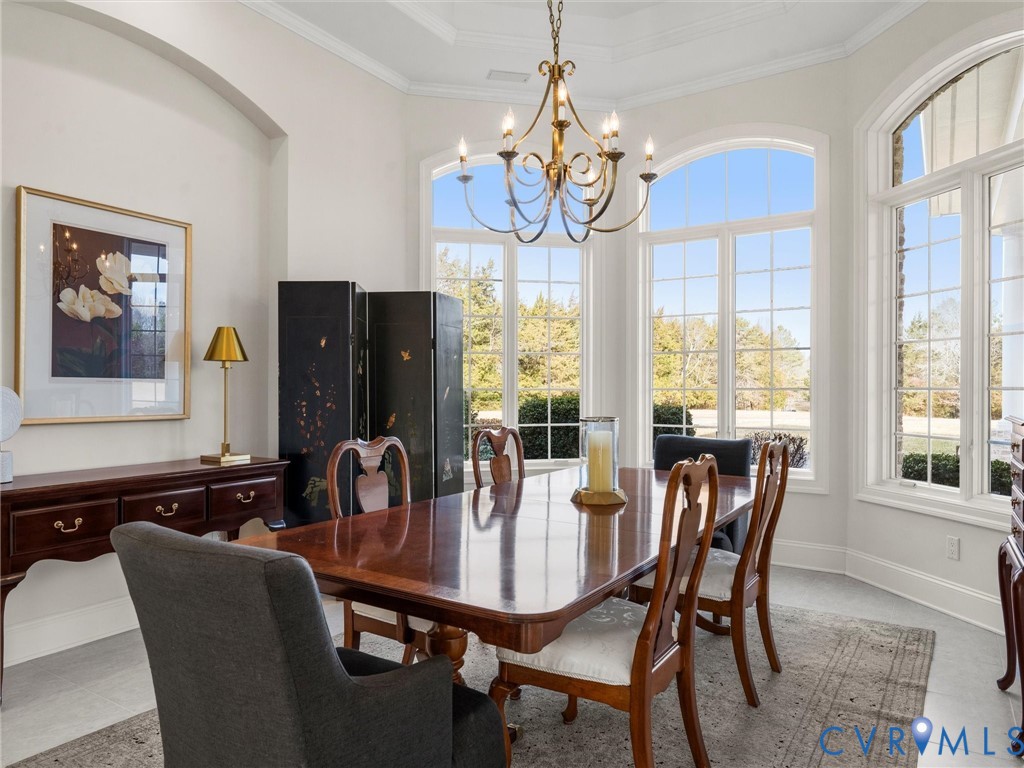 15219 Deep Spring Drive Montpelier, VA 23192 - Photo 12 of 50 DINING ROOM WITH TIERED BRASS CHANDELIER AND PANOR