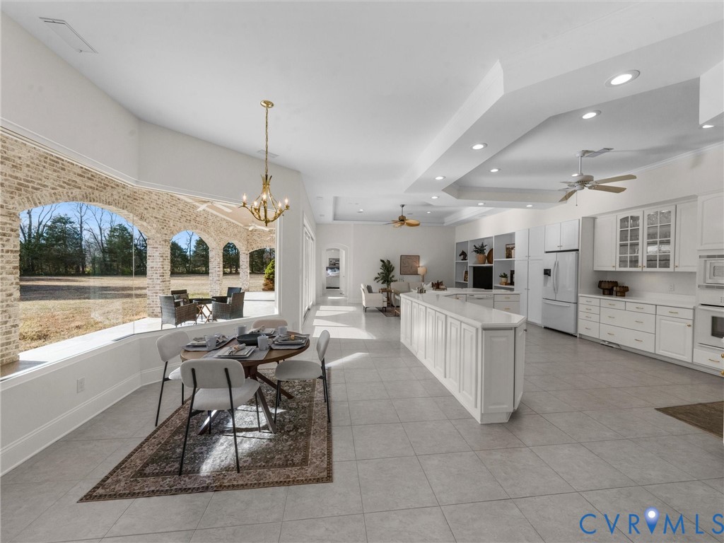 15219 Deep Spring Drive Montpelier, VA 23192 - Photo 17 of 50 ENTERING BREAKFAST AREA, WELL APPOINTED KITCHEN AN