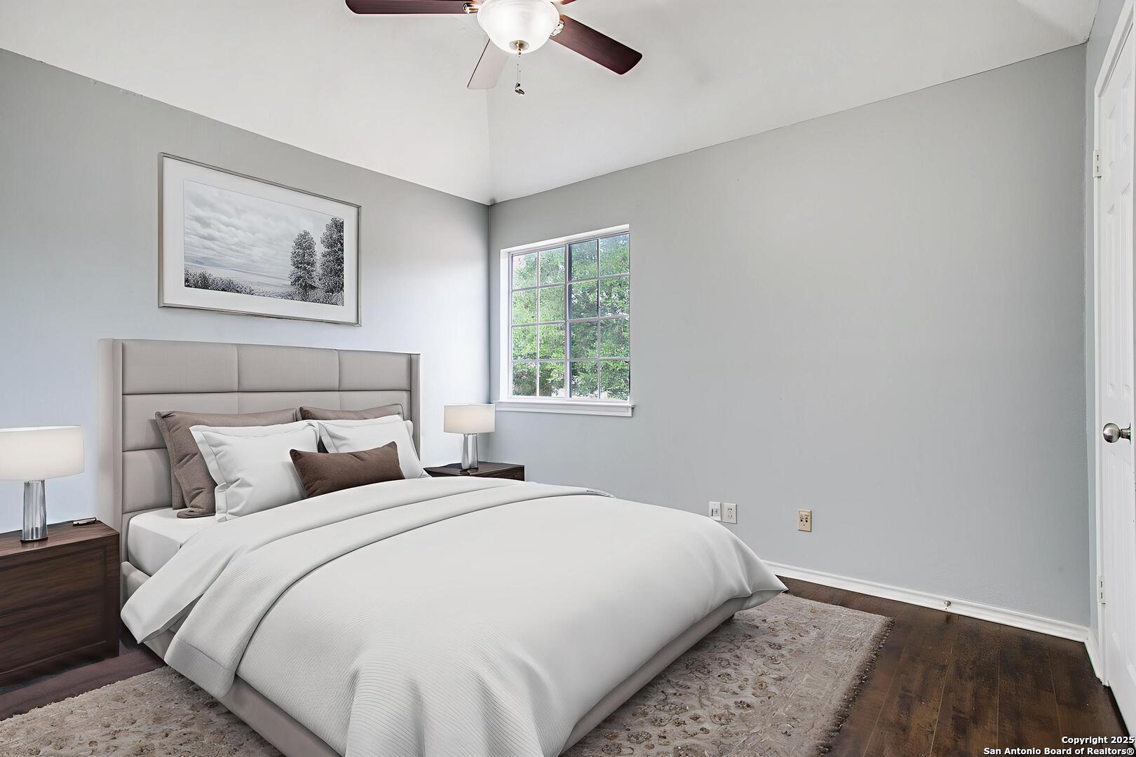 5834 Spring Crossing San Antonio, TX 78247 - Photo 14 of 29 a bedroom with a large bed and a window