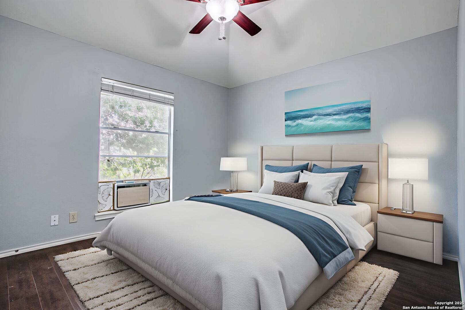 5834 Spring Crossing San Antonio, TX 78247 - Photo 17 of 29 a bedroom with a large bed and a window