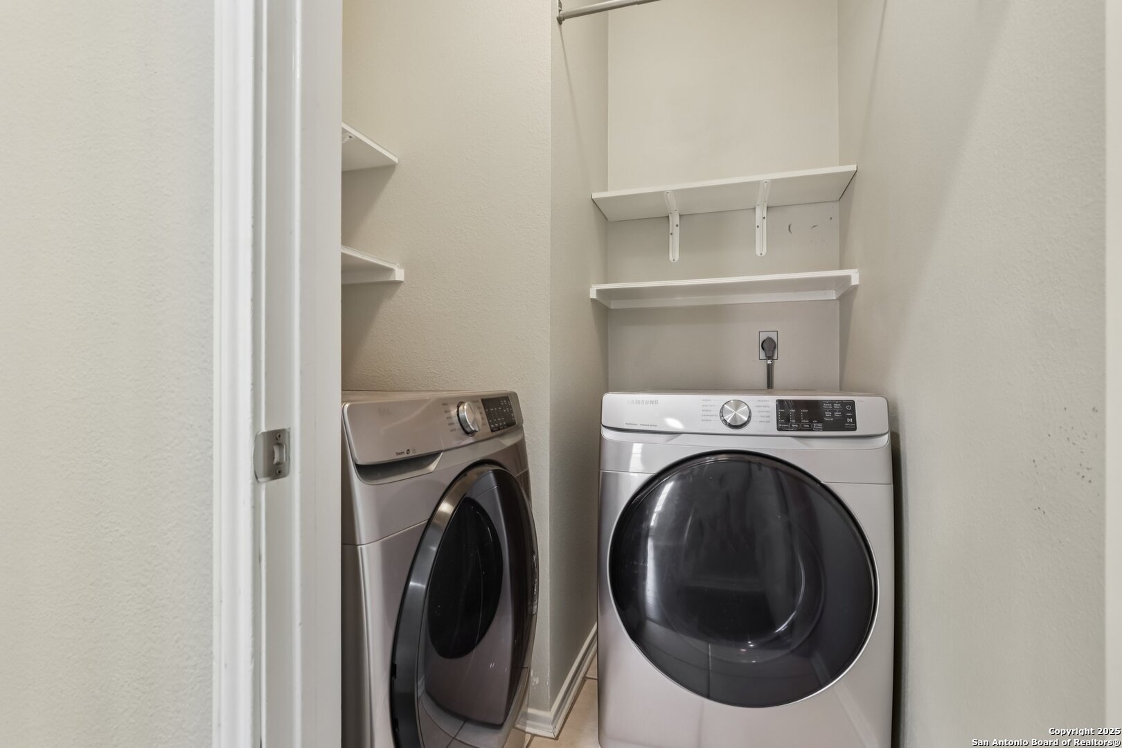 5834 Spring Crossing San Antonio, TX 78247 - Photo 18 of 29 a utility room with dryer and washer