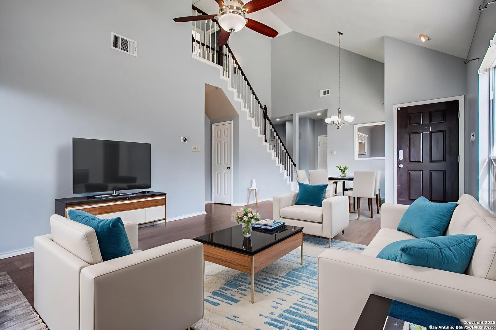 5834 Spring Crossing San Antonio, TX 78247 - Photo 6 of 29 a living room with furniture and a flat screen tv