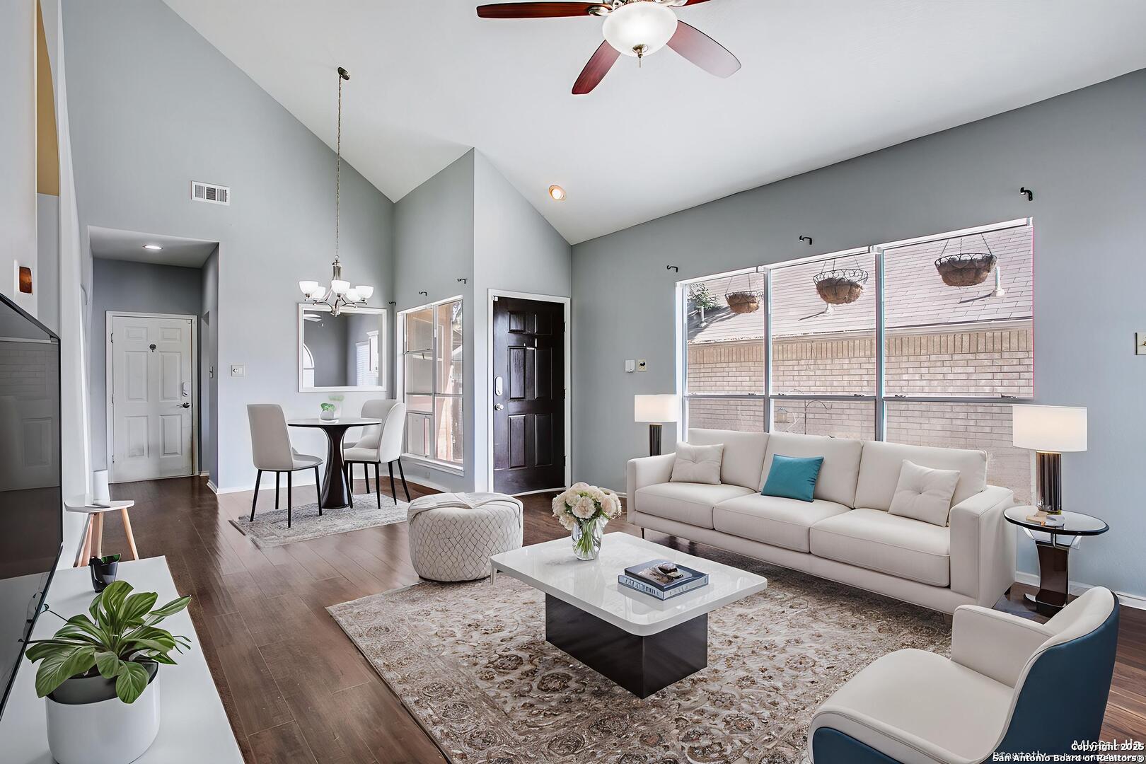 5834 Spring Crossing San Antonio, TX 78247 - Photo 8 of 29 a living room with furniture and a large window